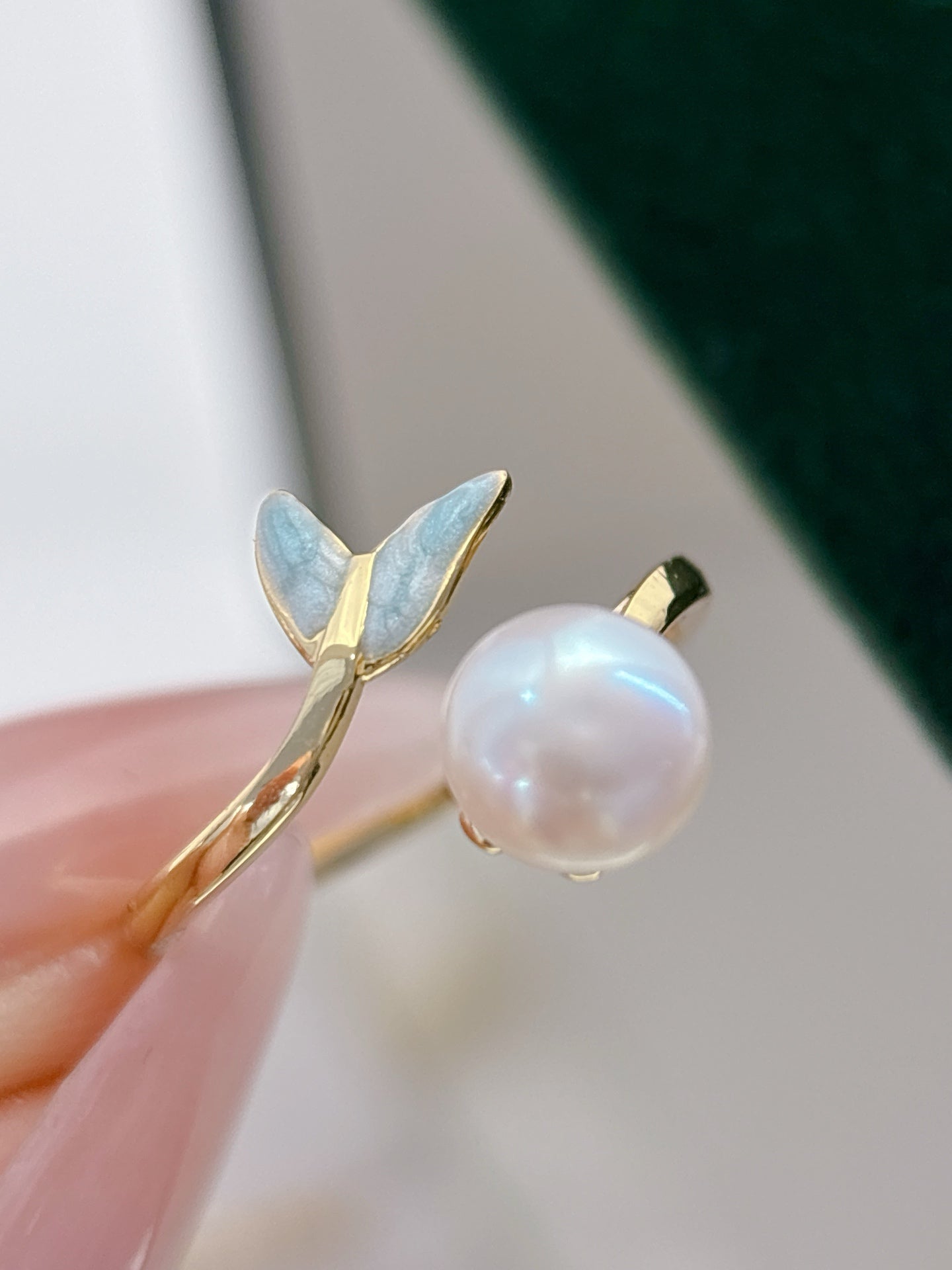 Mermaid pearl jewelry set with earrings, ring, and necklace featuring freshwater pearls and elegant fish-tail details.