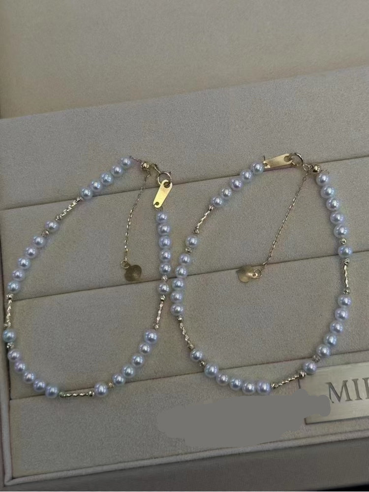 Minimalist bracelet with 3–4mm freshwater baby pearls and 14k gold-plated adjustable chain, delicate and elegant design.
