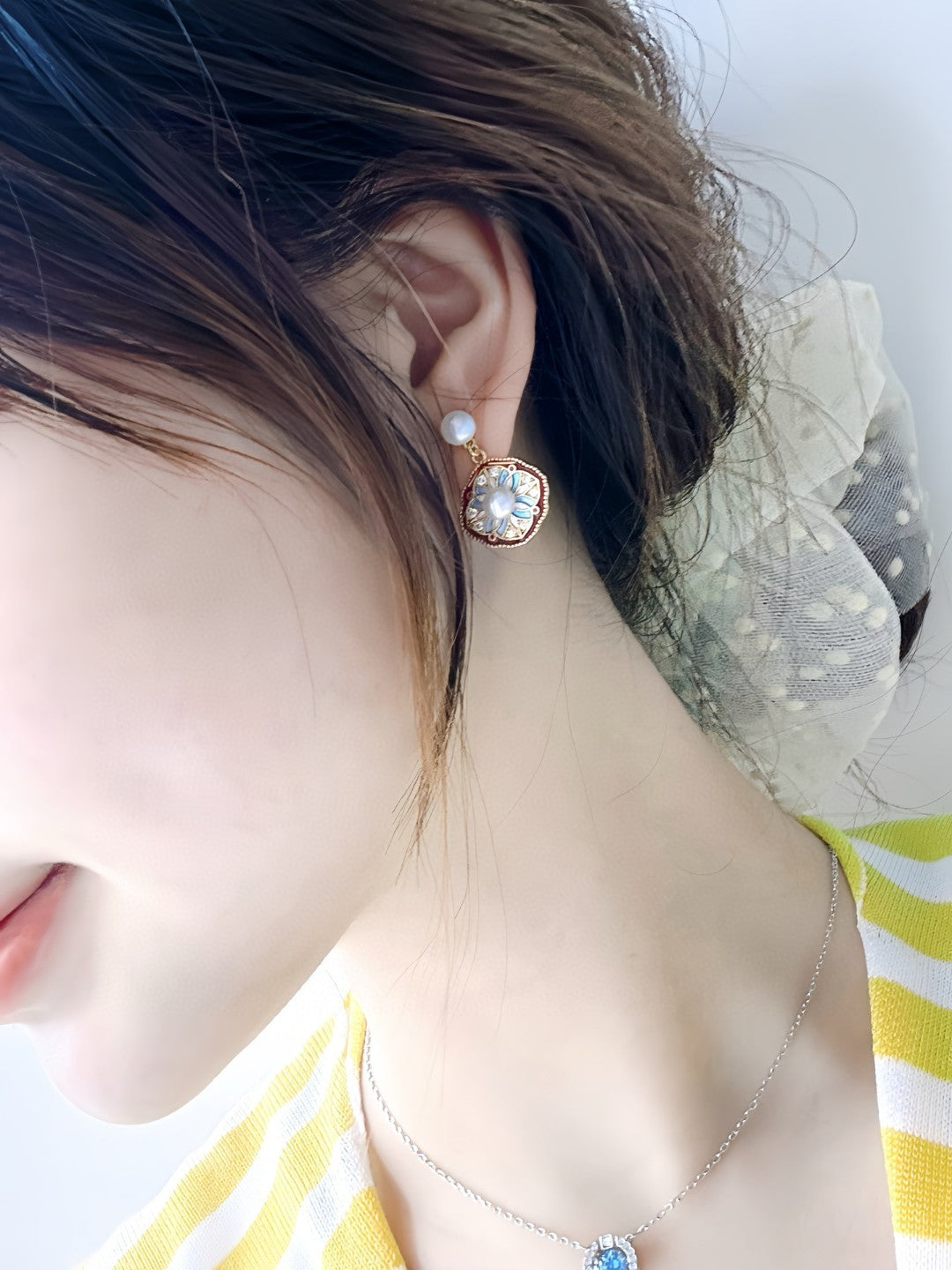Elegant twin pearl stud earrings inspired by clover design in sterling silver