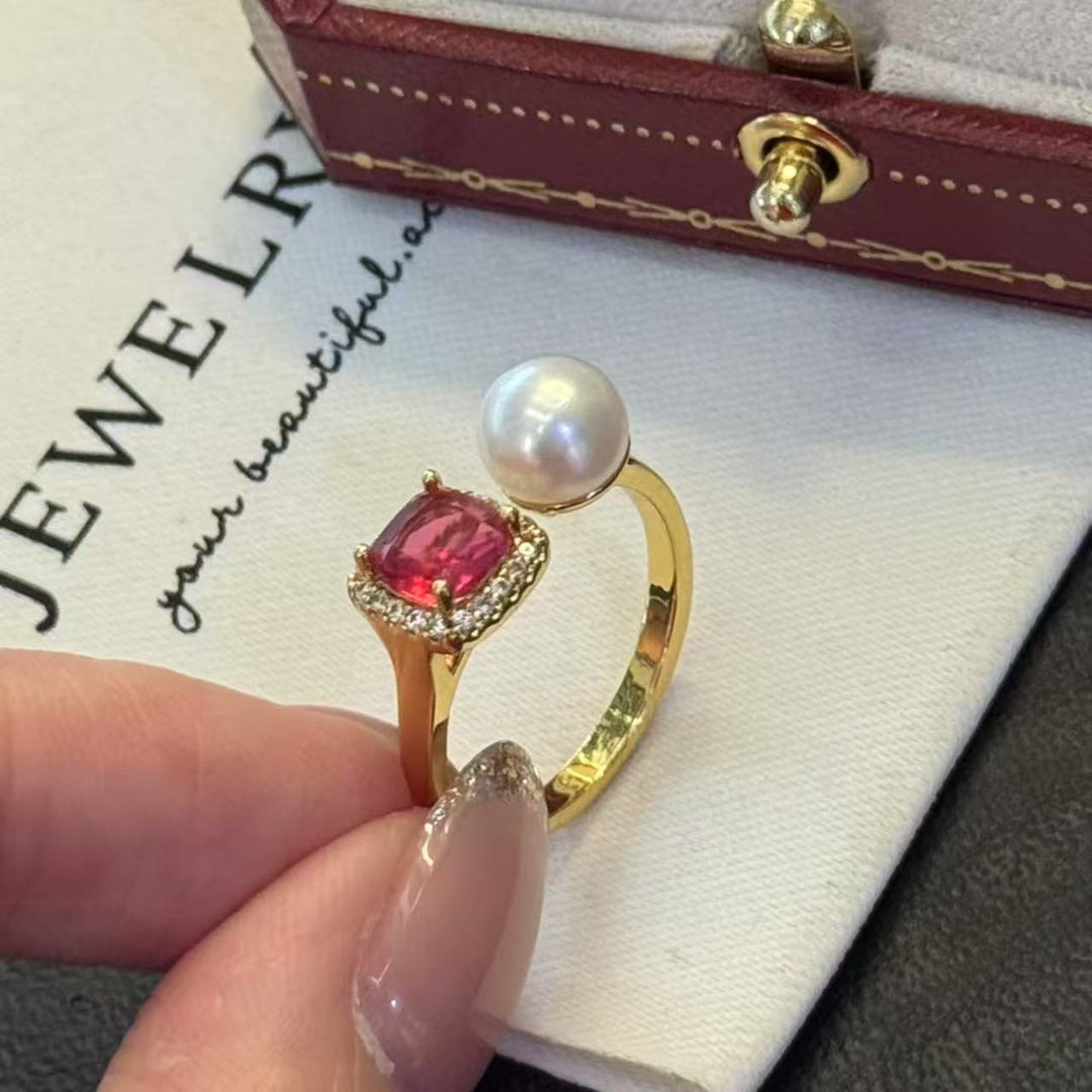 Ruby-inspired gold ring with a freshwater pearl centerpiece