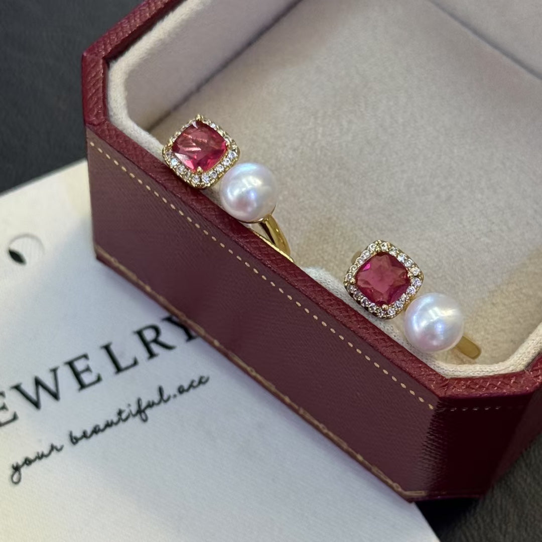 Ruby-inspired gold ring with a freshwater pearl centerpiece