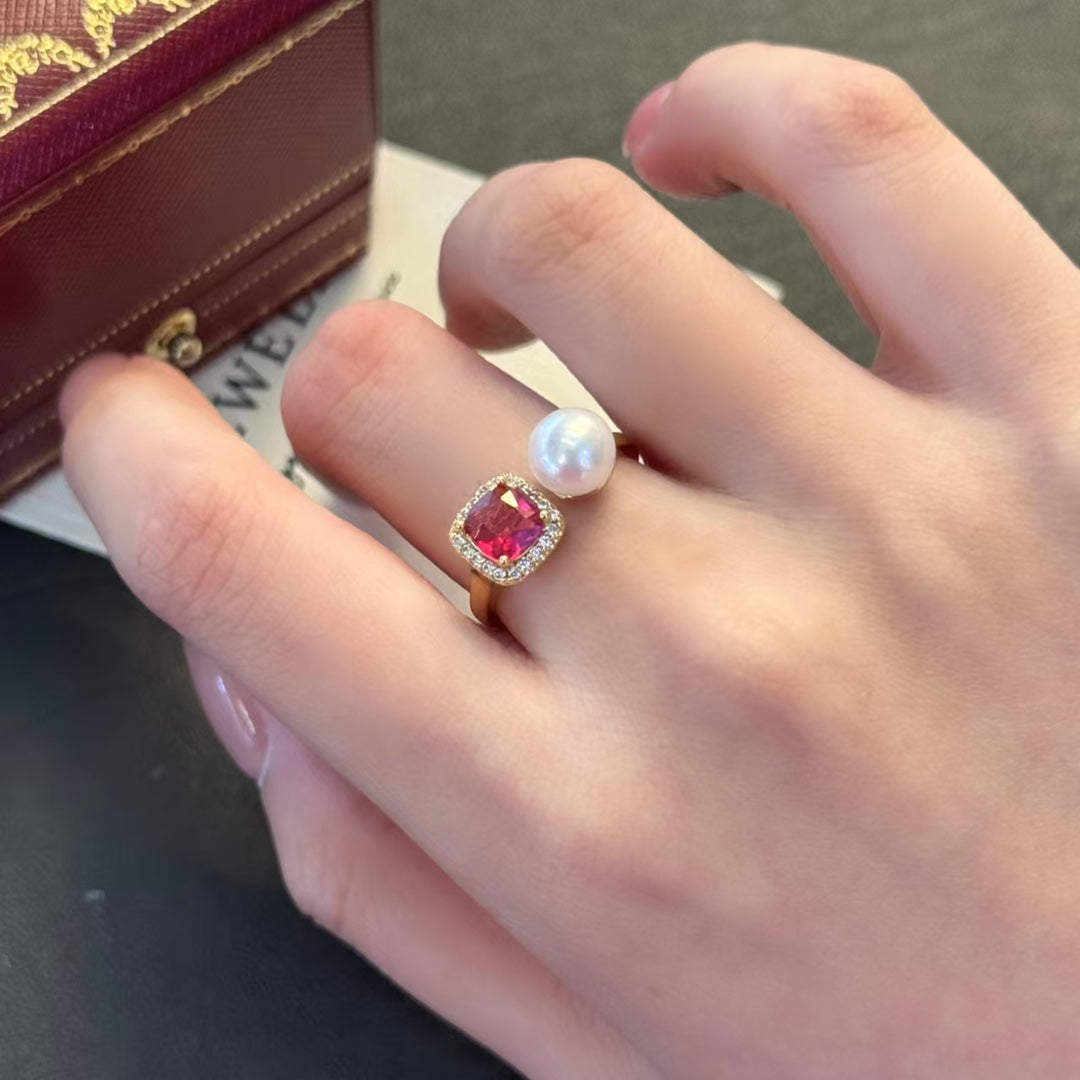 Ruby-inspired gold ring with a freshwater pearl centerpiece