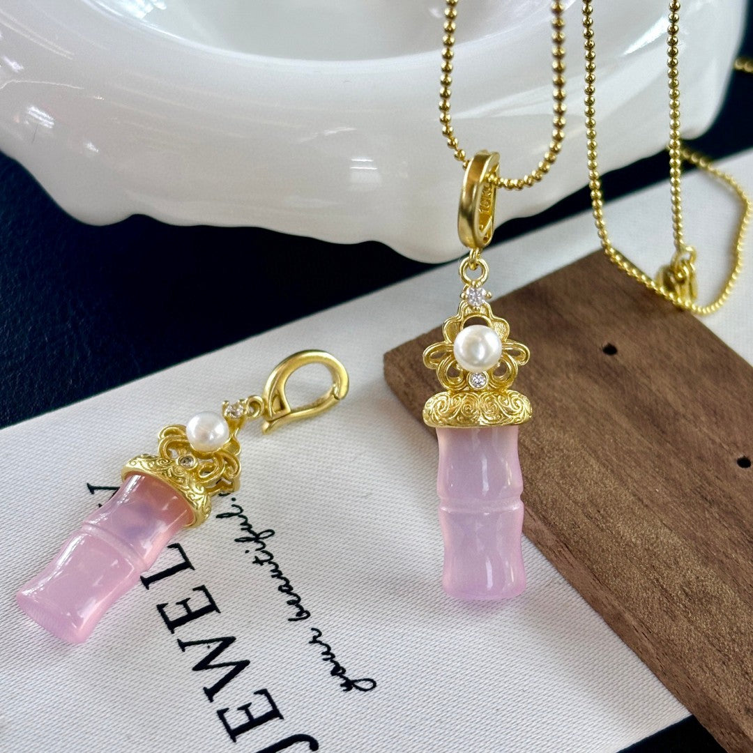 Jade and freshwater pearl pendant with bamboo-inspired gold accent