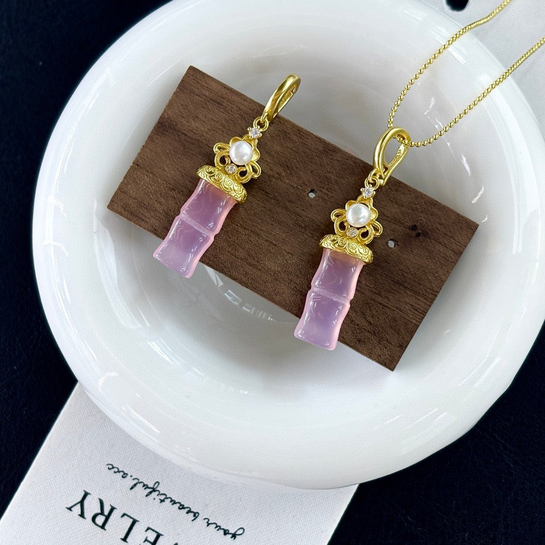 Jade and freshwater pearl pendant with bamboo-inspired gold accent