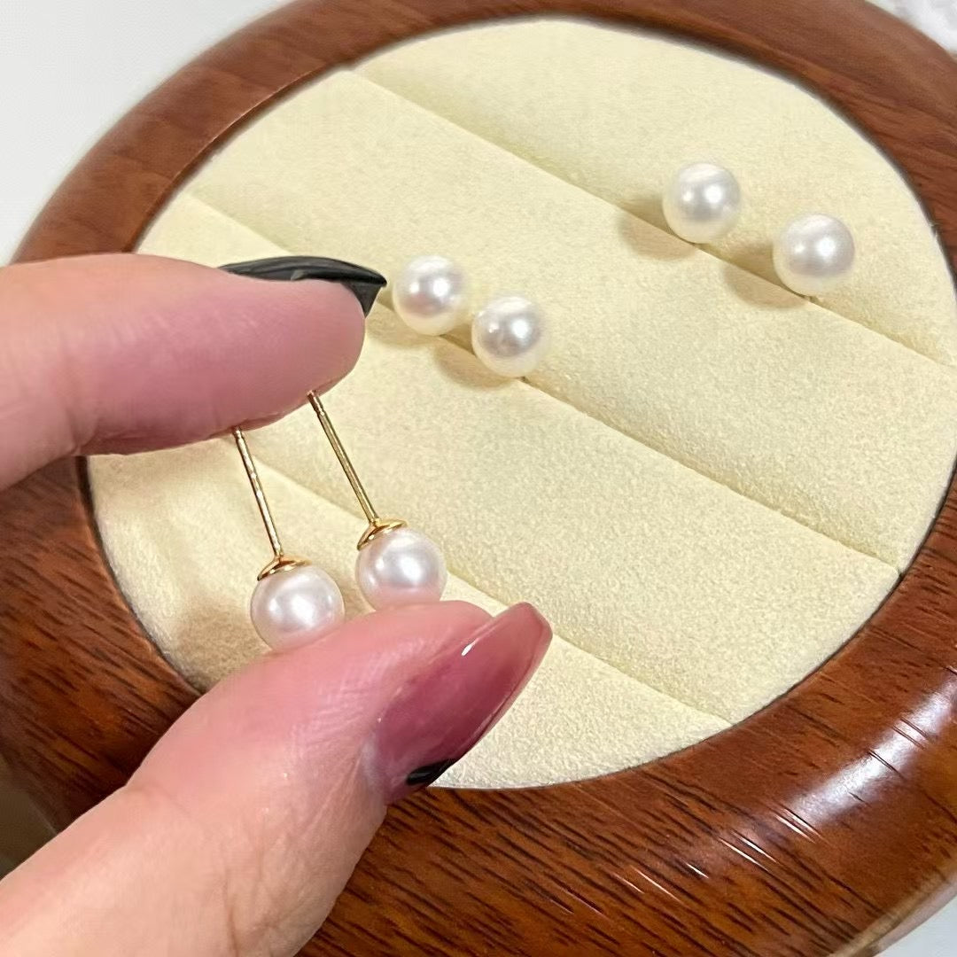 High-luster near-round freshwater pearl necklace with bonus pearl studs