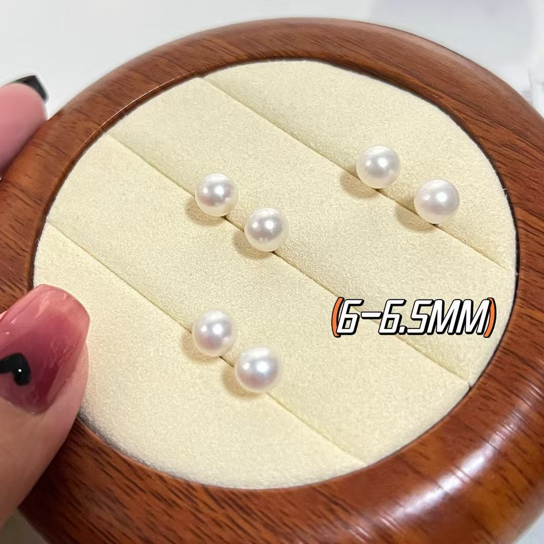 High-luster near-round freshwater pearl necklace with bonus pearl studs