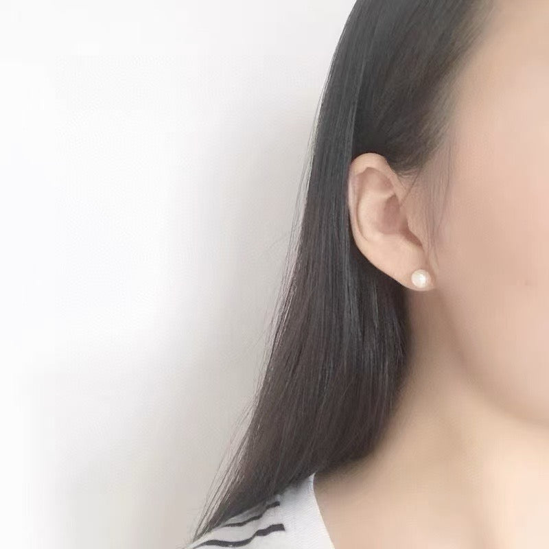 High-luster near-round freshwater pearl necklace with bonus pearl studs