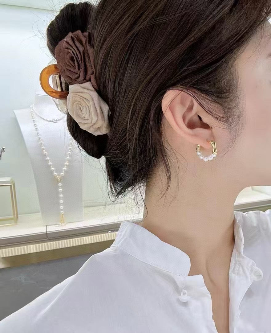 French-style vintage pearl earrings with dual-wear swing design.