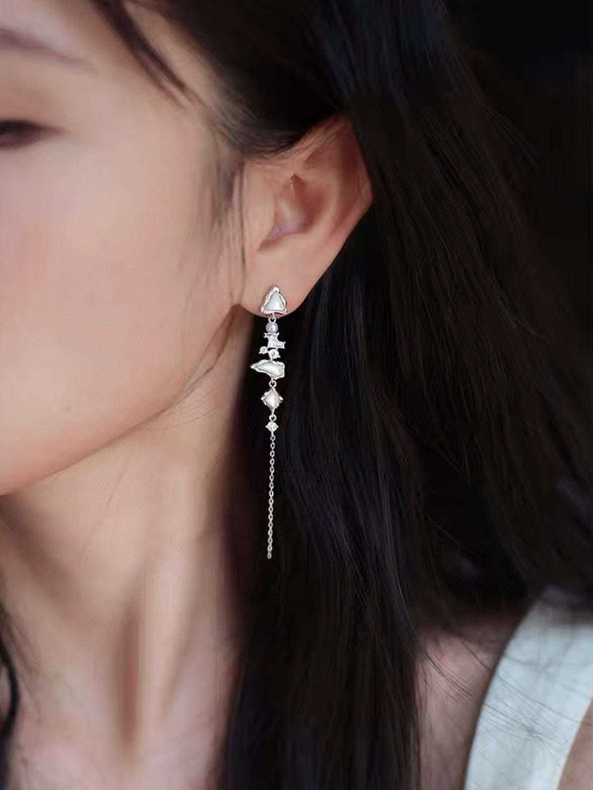 Glacier Cascade earrings with freshwater pearls, inspired by iceflow and cascading glacier forms.