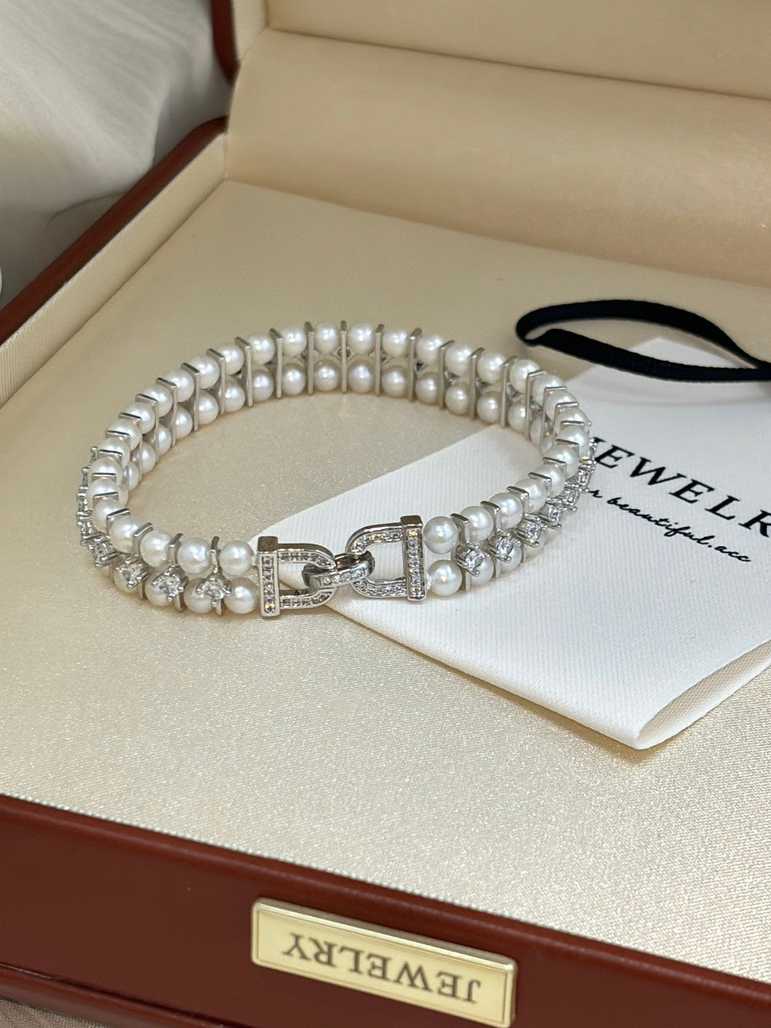 Double row freshwater pearl bracelet with zircon and custom clasp