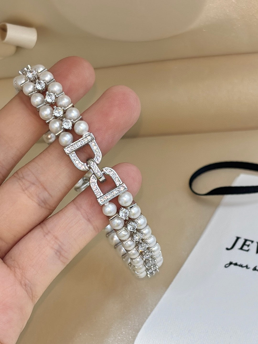 Double row freshwater pearl bracelet with zircon and custom clasp