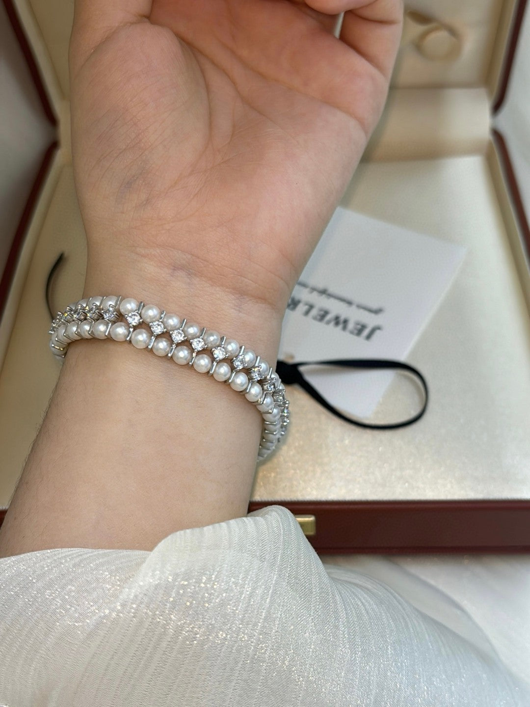 Double row freshwater pearl bracelet with zircon and custom clasp