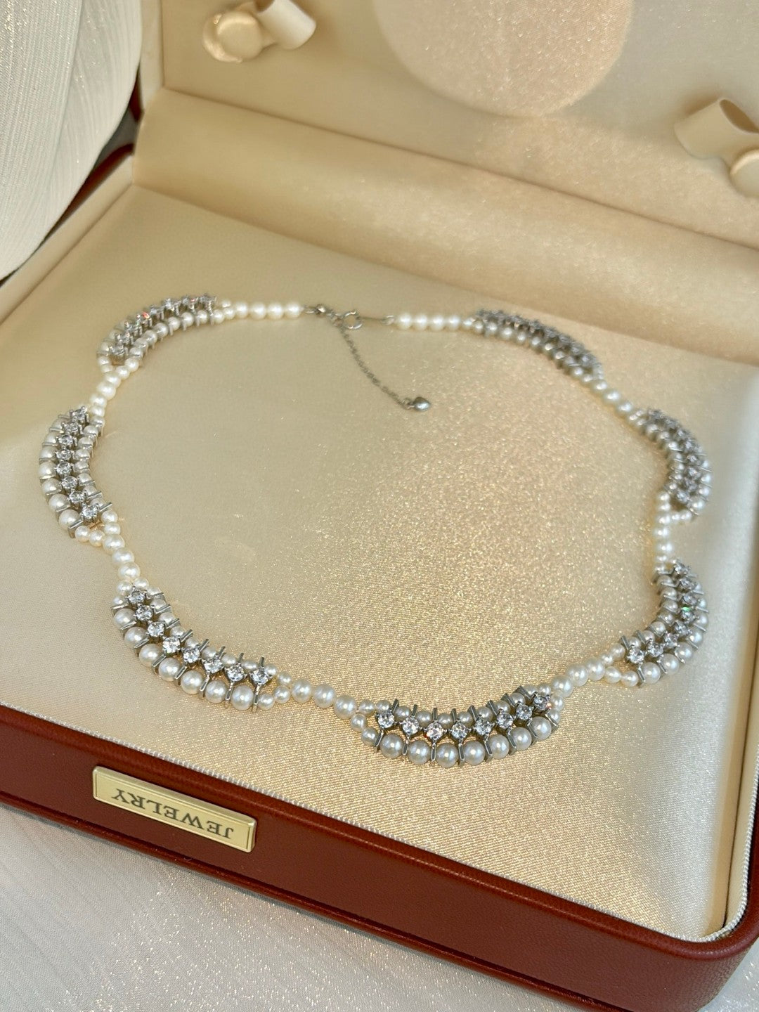 Handmade floral wave pearl necklace with small freshwater pearls