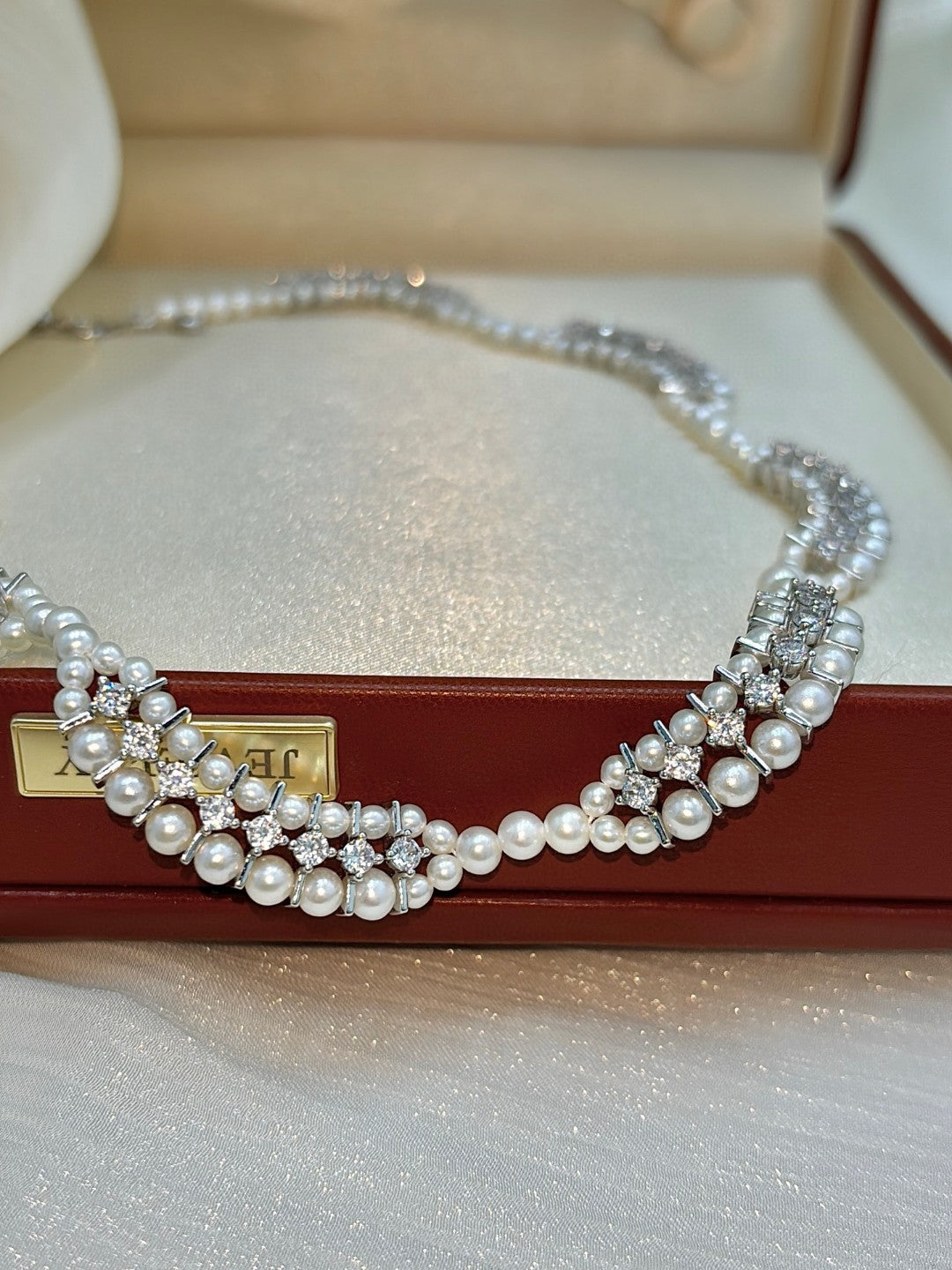 Handmade floral wave pearl necklace with small freshwater pearls