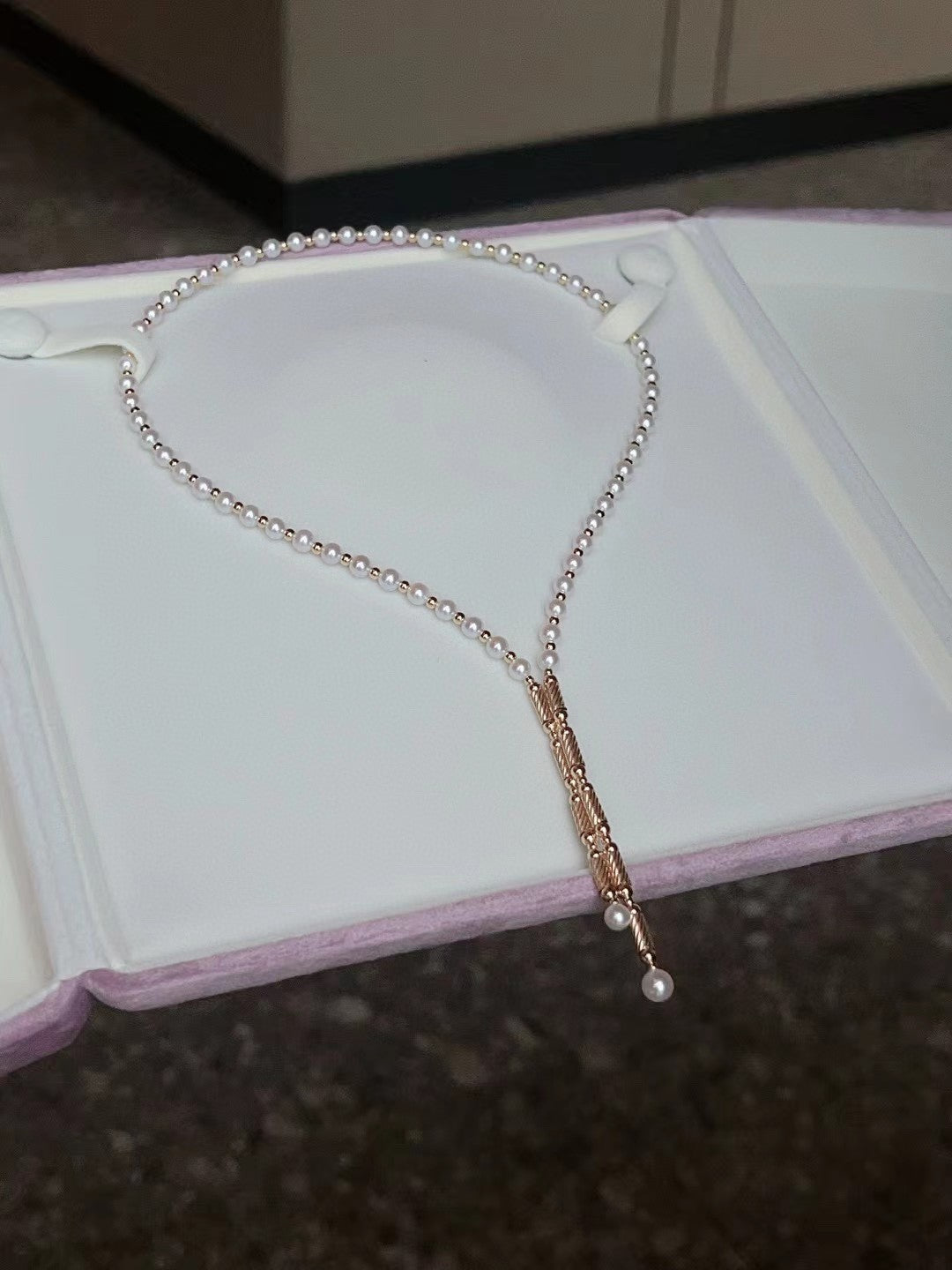 Convertible pearl necklace with magnetic clasp, showing multiple wearing styles