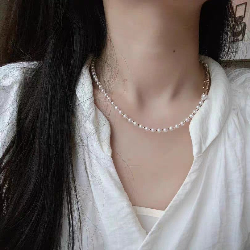 Convertible pearl necklace with magnetic clasp, showing multiple wearing styles