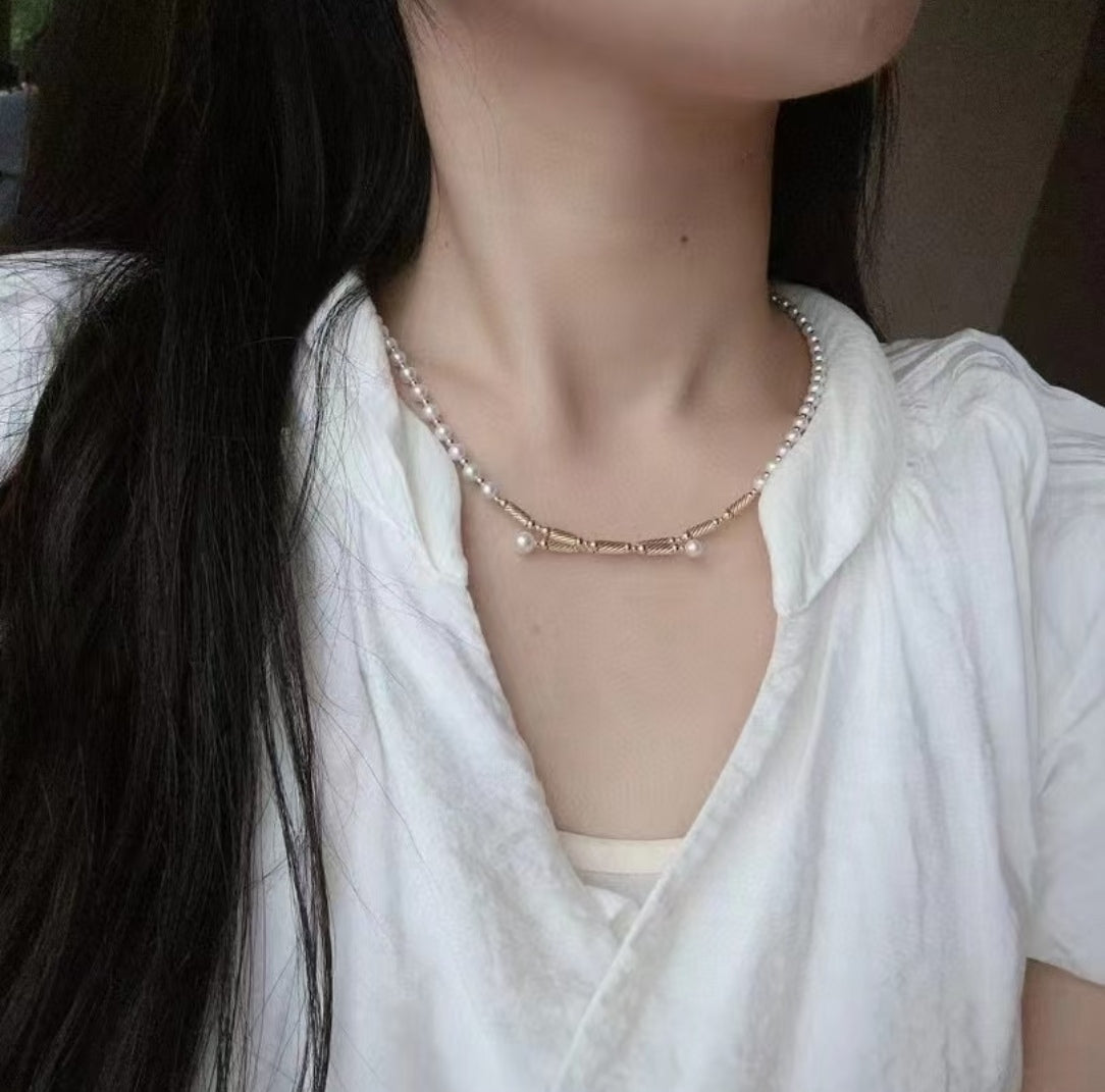 Convertible pearl necklace with magnetic clasp, showing multiple wearing styles