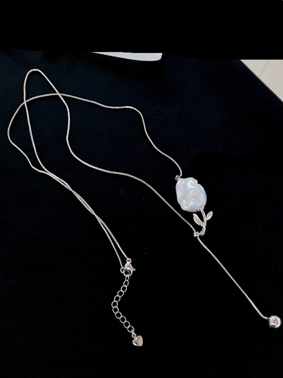 Y-shaped necklace with baroque freshwater pearls and rose charm, adjustable design