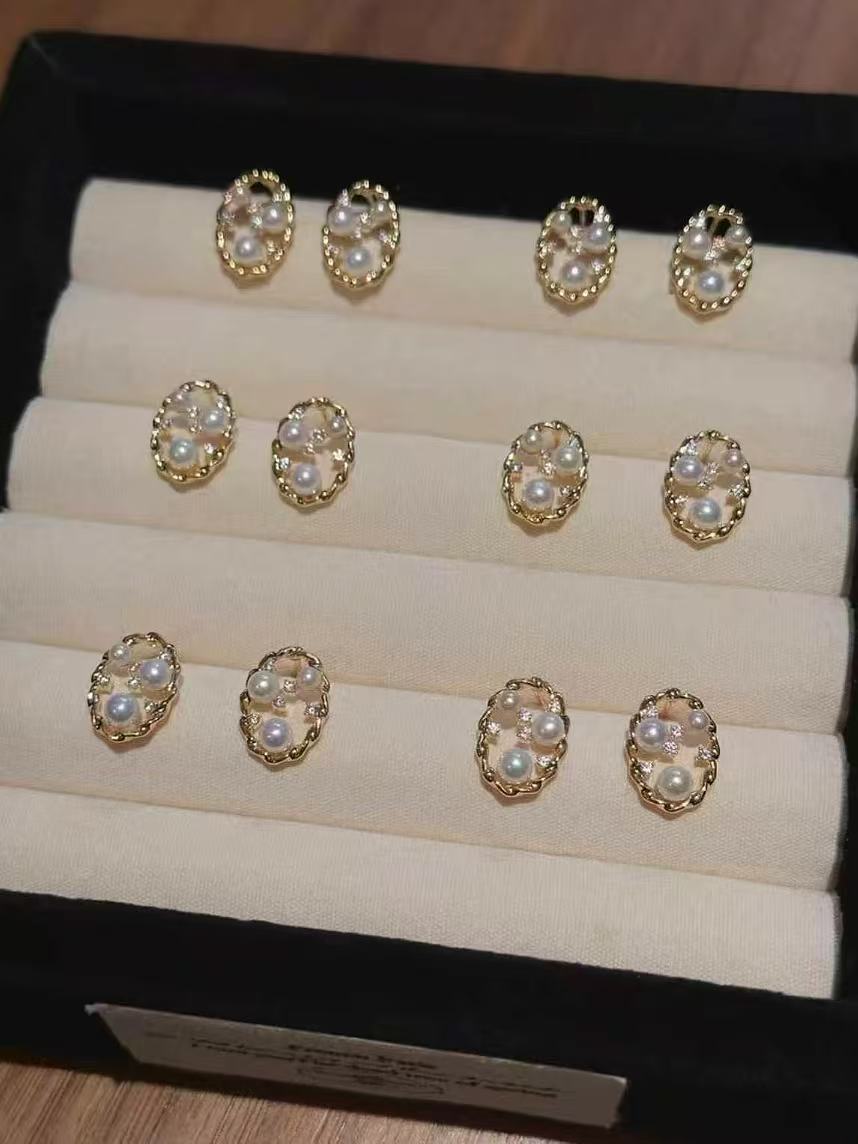 Vintage gold twisted pearl earrings with zircon and teardrop freshwater pearls