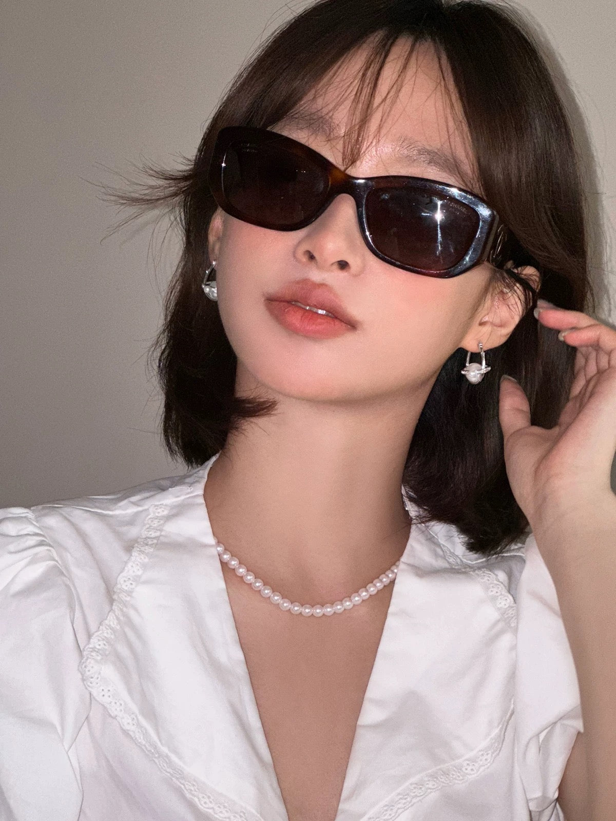 Sphère silver ear clip with Akoya and Edison pearls in celestial arc shape