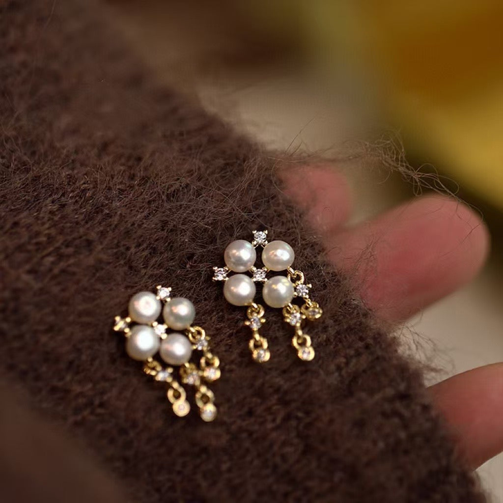 Sterling silver pearl earrings with four-leaf clover design and 4-5mm freshwater pearls