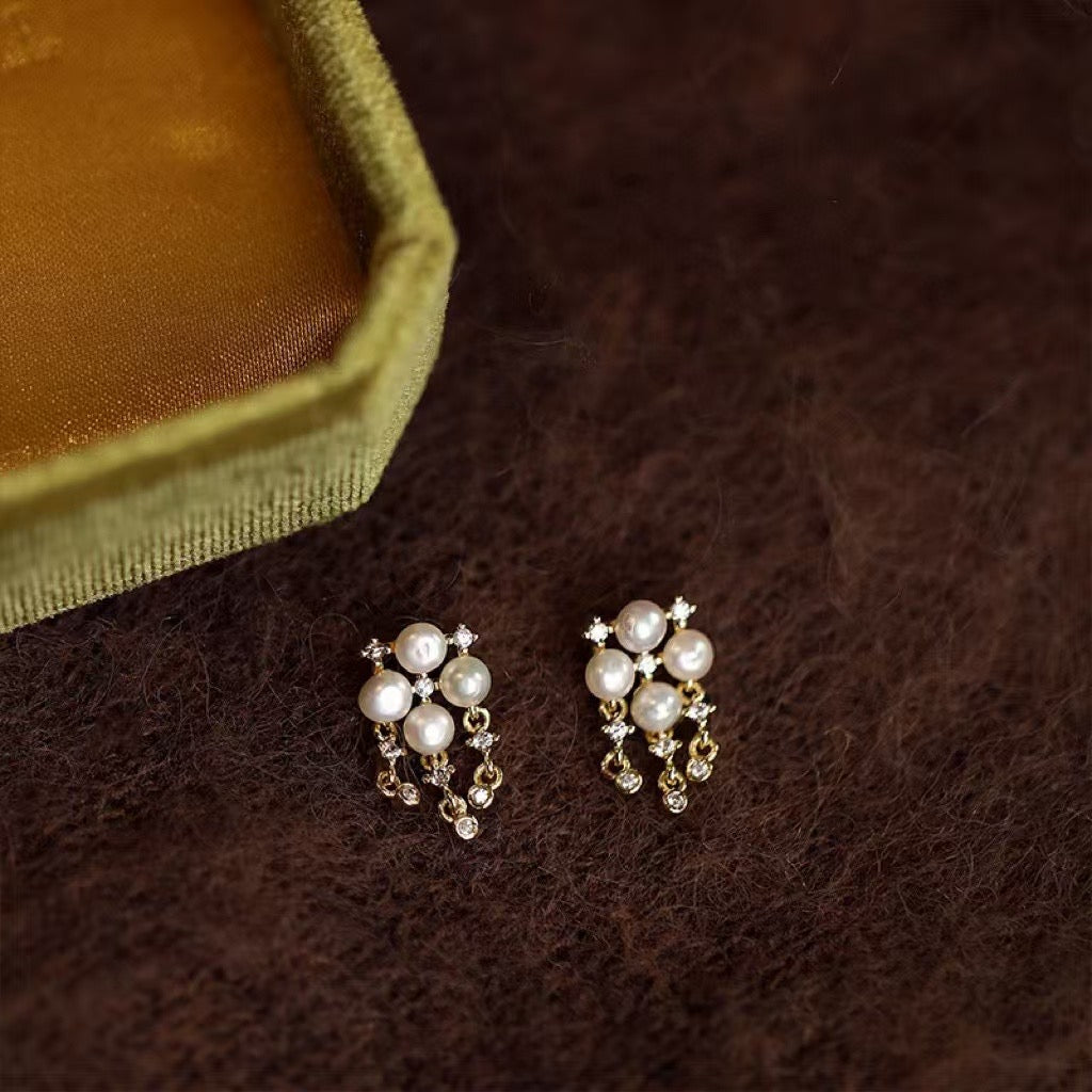 Sterling silver pearl earrings with four-leaf clover design and 4-5mm freshwater pearls
