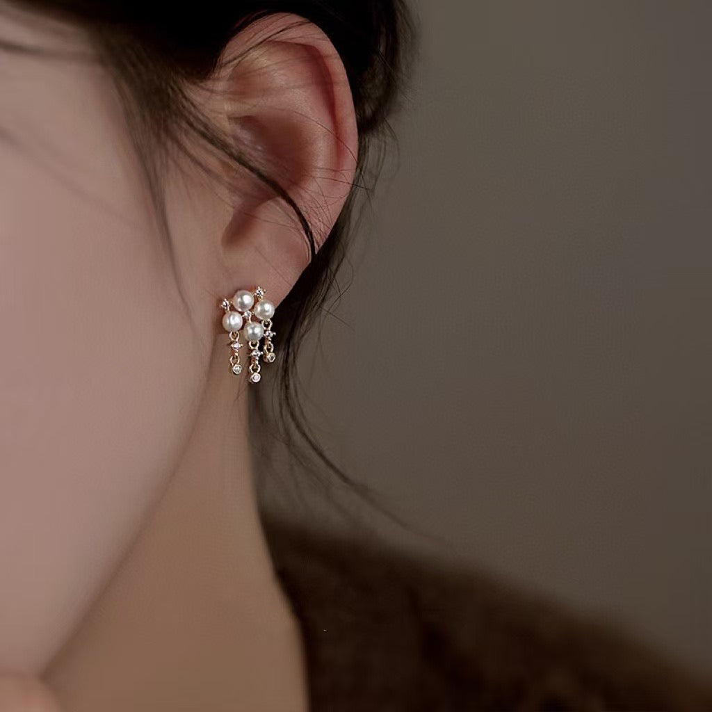 Sterling silver pearl earrings with four-leaf clover design and 4-5mm freshwater pearls