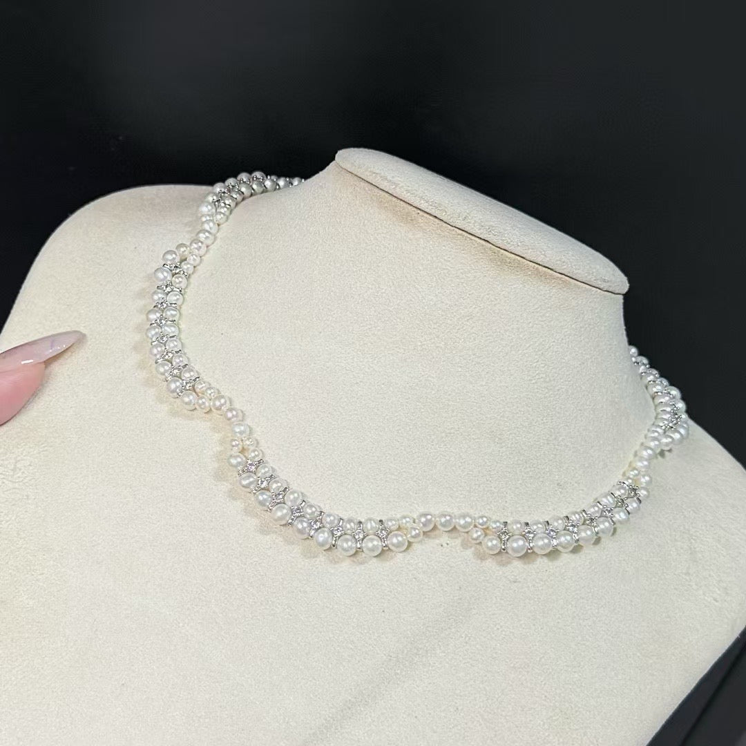 Floral wave design pearl necklace handcrafted with 3–5mm high-quality freshwater pearls, elegant artisan jewelry piece