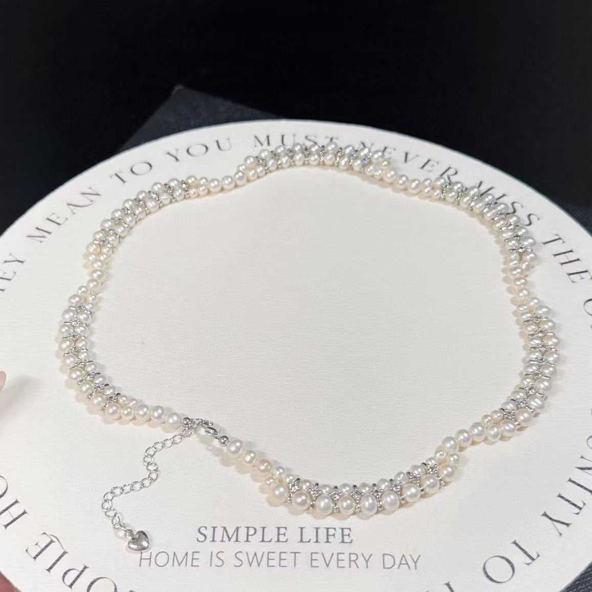 Floral wave design pearl necklace handcrafted with 3–5mm high-quality freshwater pearls, elegant artisan jewelry piece