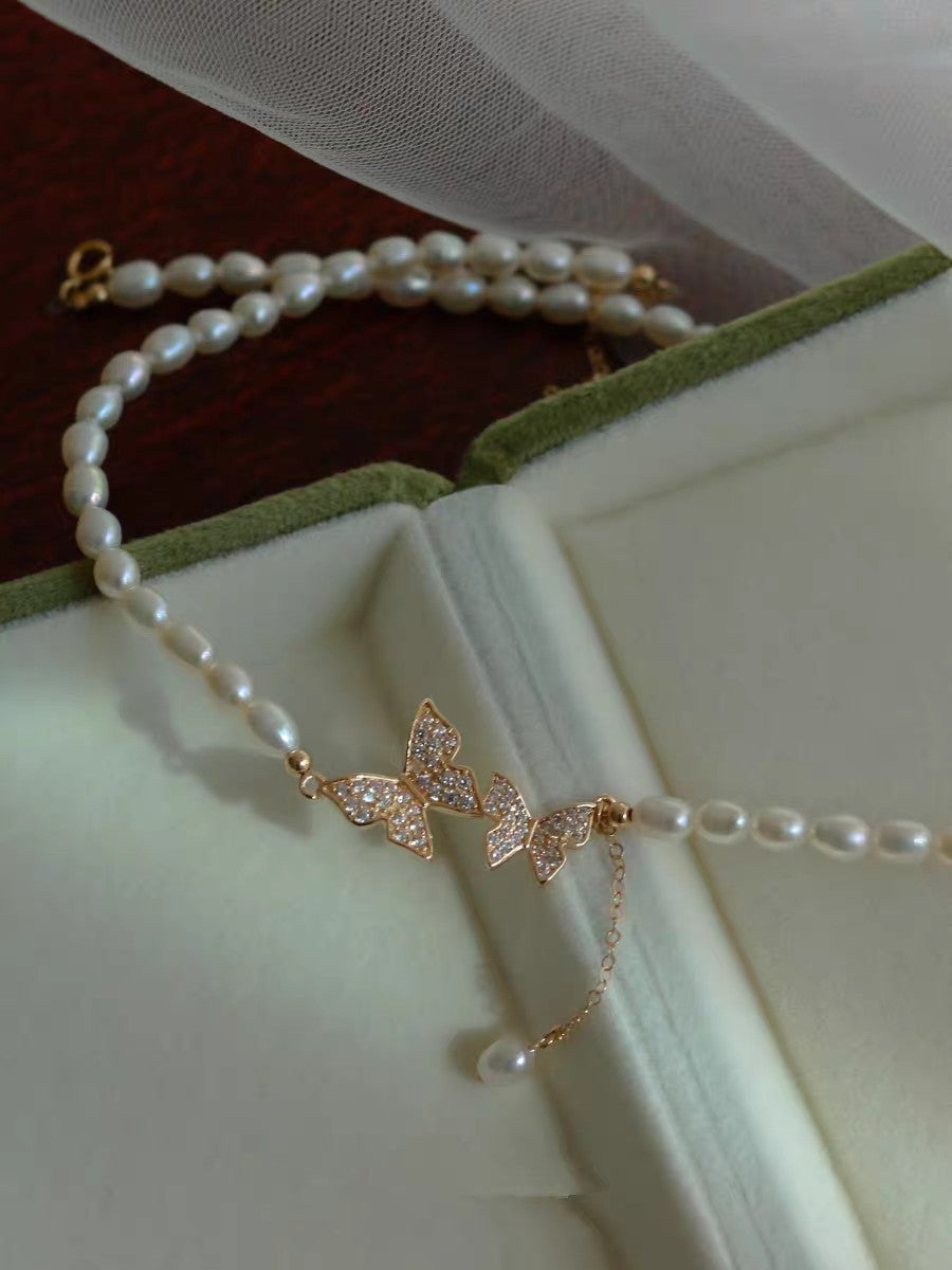 AnSes & Co. gift box with butterfly choker necklace inside