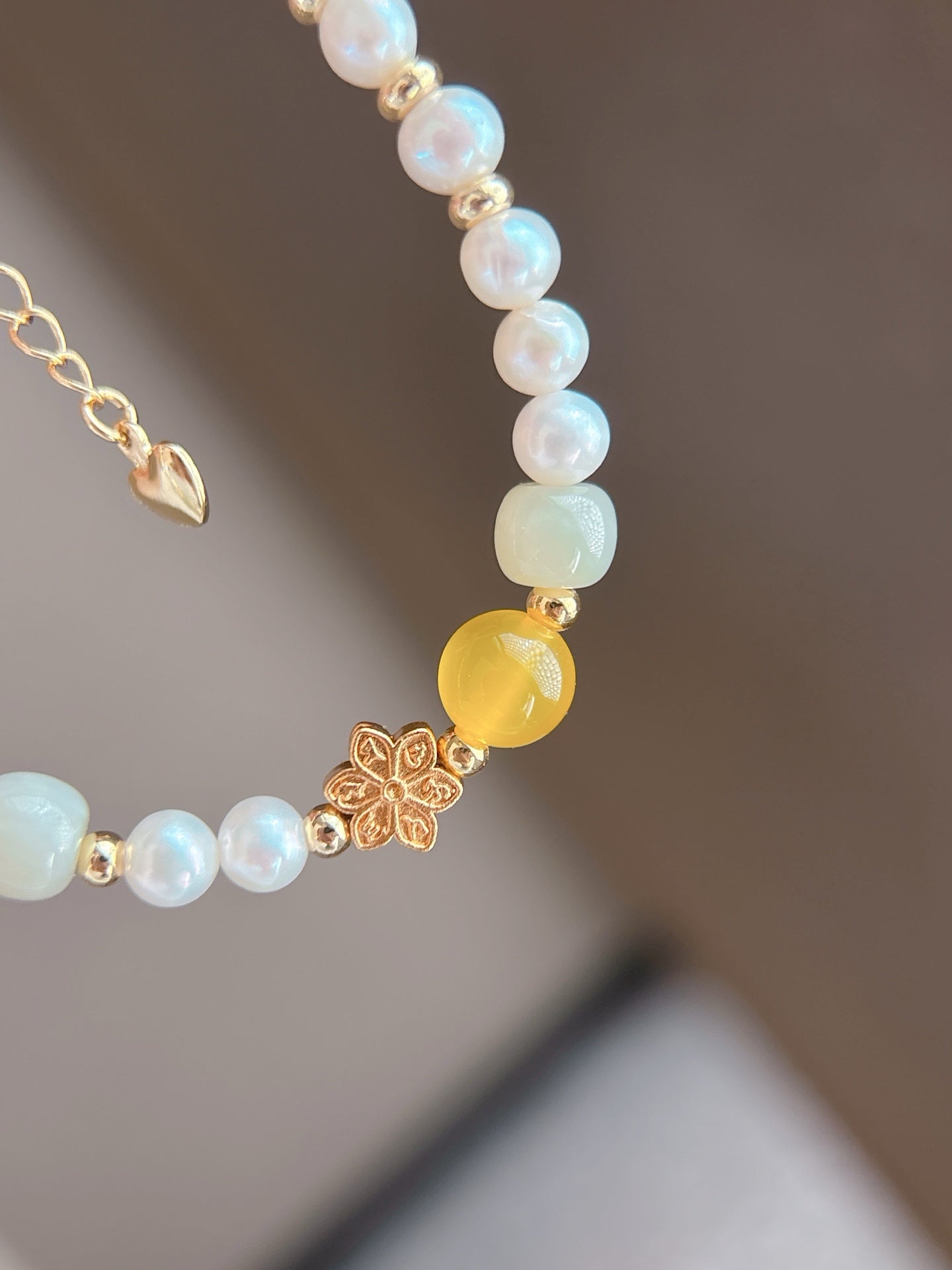 Close-up of natural pearls and sparkling crystal accents