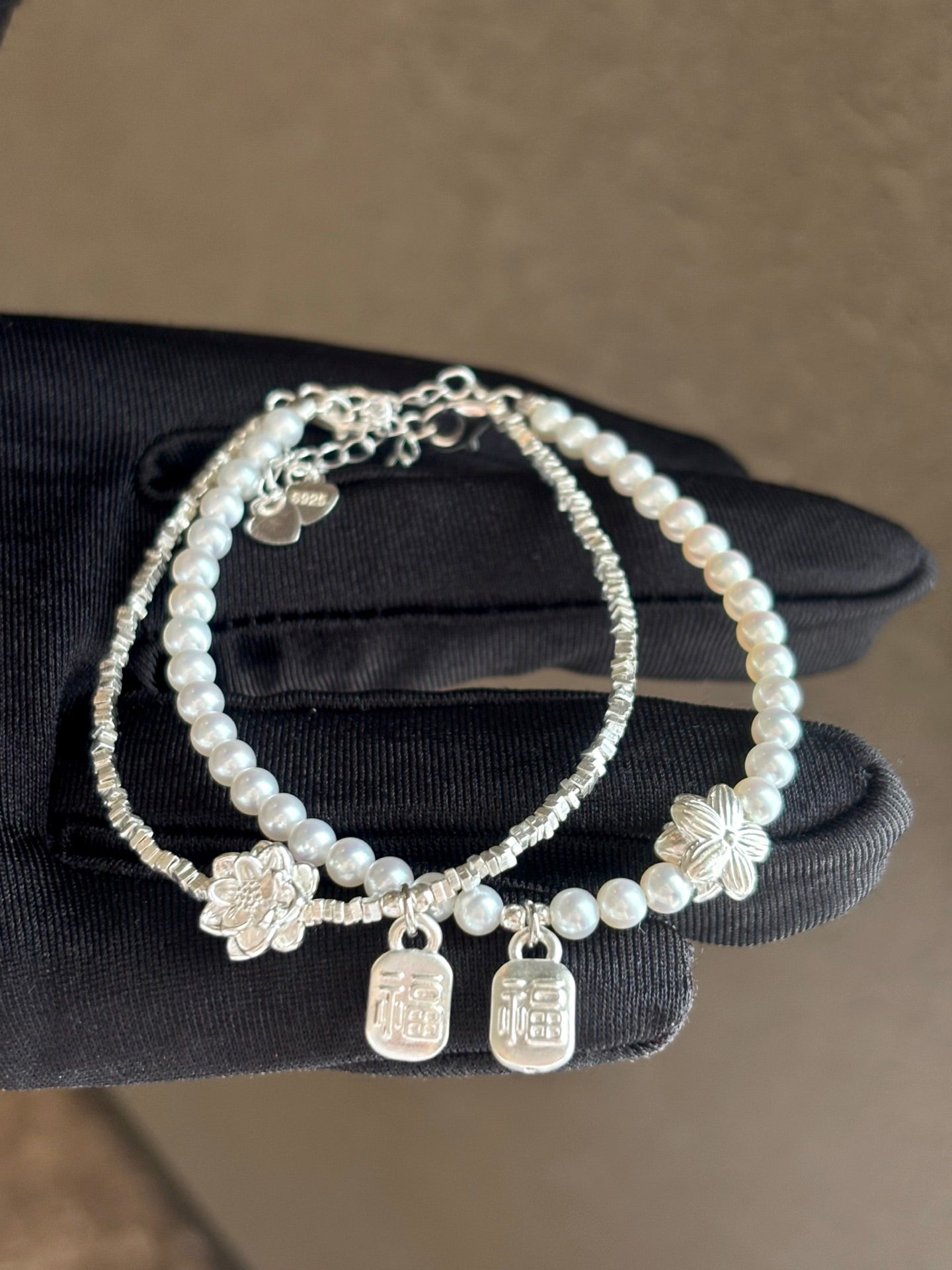Sterling silver bracelet with lotus flower and blessing 福 charm