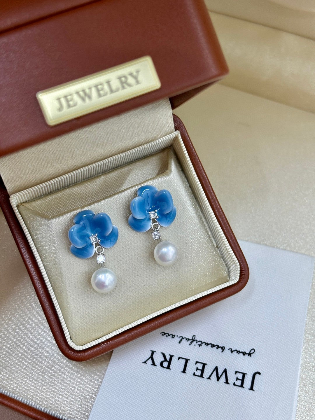 Close-up of blue blossom petals and tiny zircon details