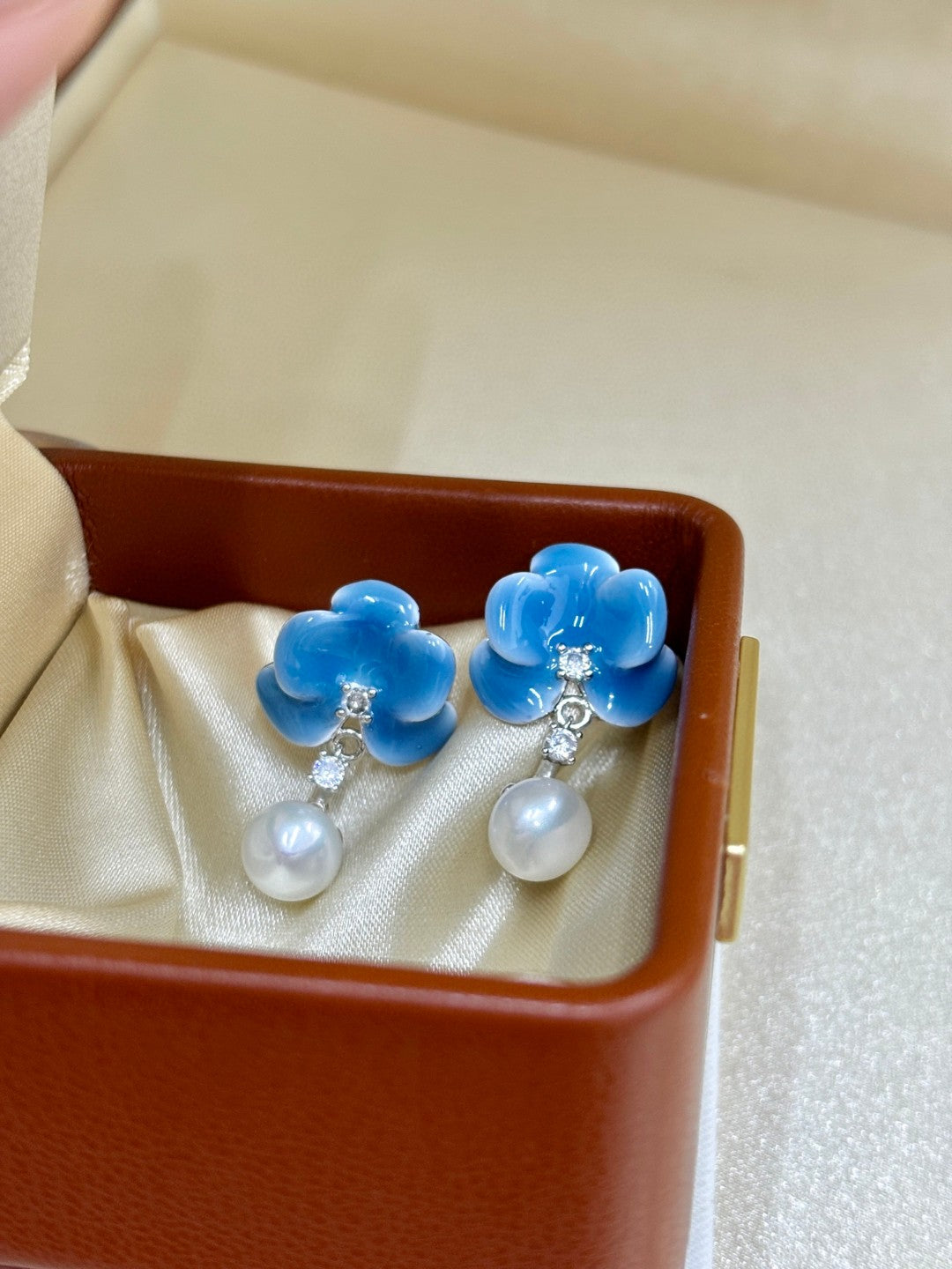 Close-up of blue blossom petals and tiny zircon details