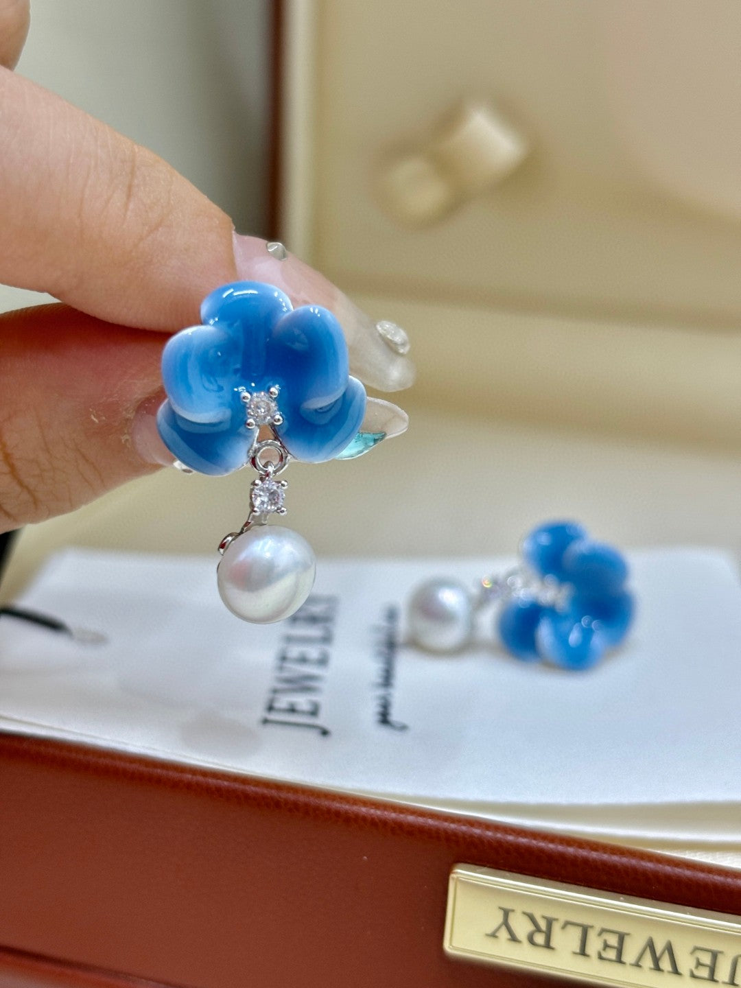 Close-up of blue blossom petals and tiny zircon details
