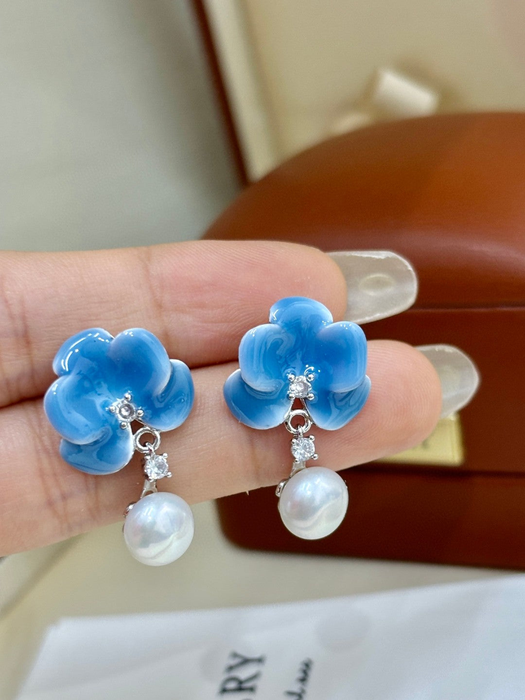 Close-up of blue blossom petals and tiny zircon details