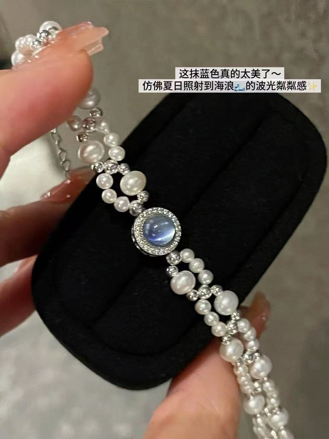 Close-up of 3–6mm lustrous pearls with silver weaving and aquamarine beads