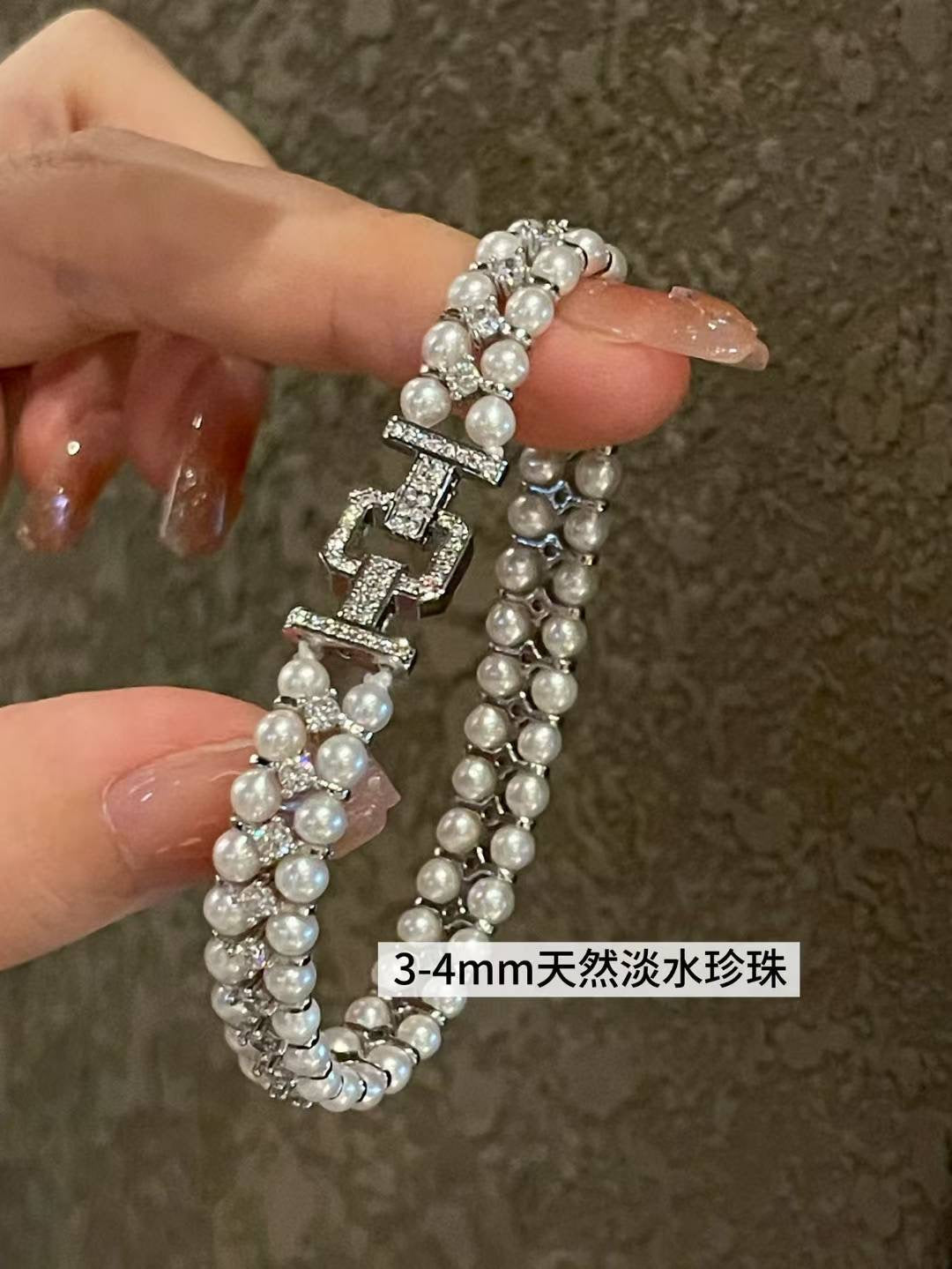 Close-up of 3–4mm freshwater pearls with sparkling zircon settings