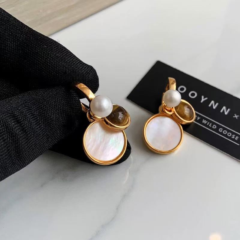 Earrings in warm Maillard-inspired tones