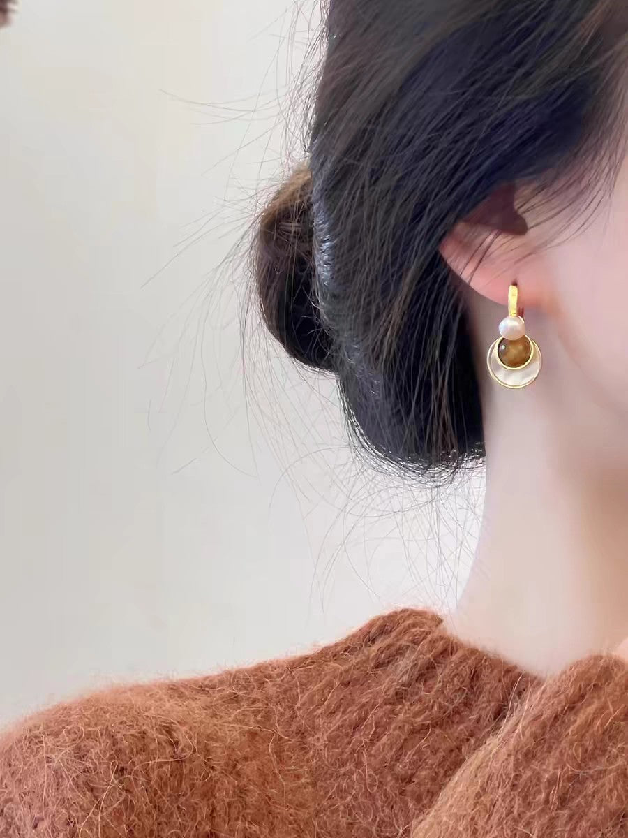 Earrings in warm Maillard-inspired tones