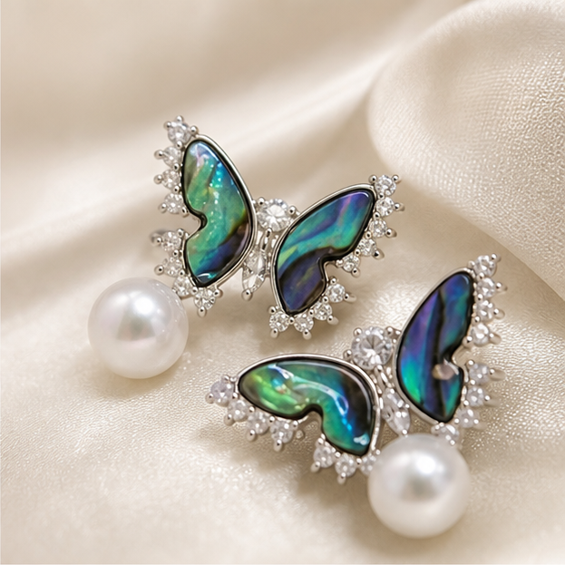 Macro product detail of Aurora Wing – Butterfly Pearl Studs