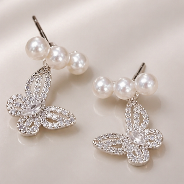 Macro product detail of Butterfly Freshwater Pearl Stud Earrings – Delicate Elegance