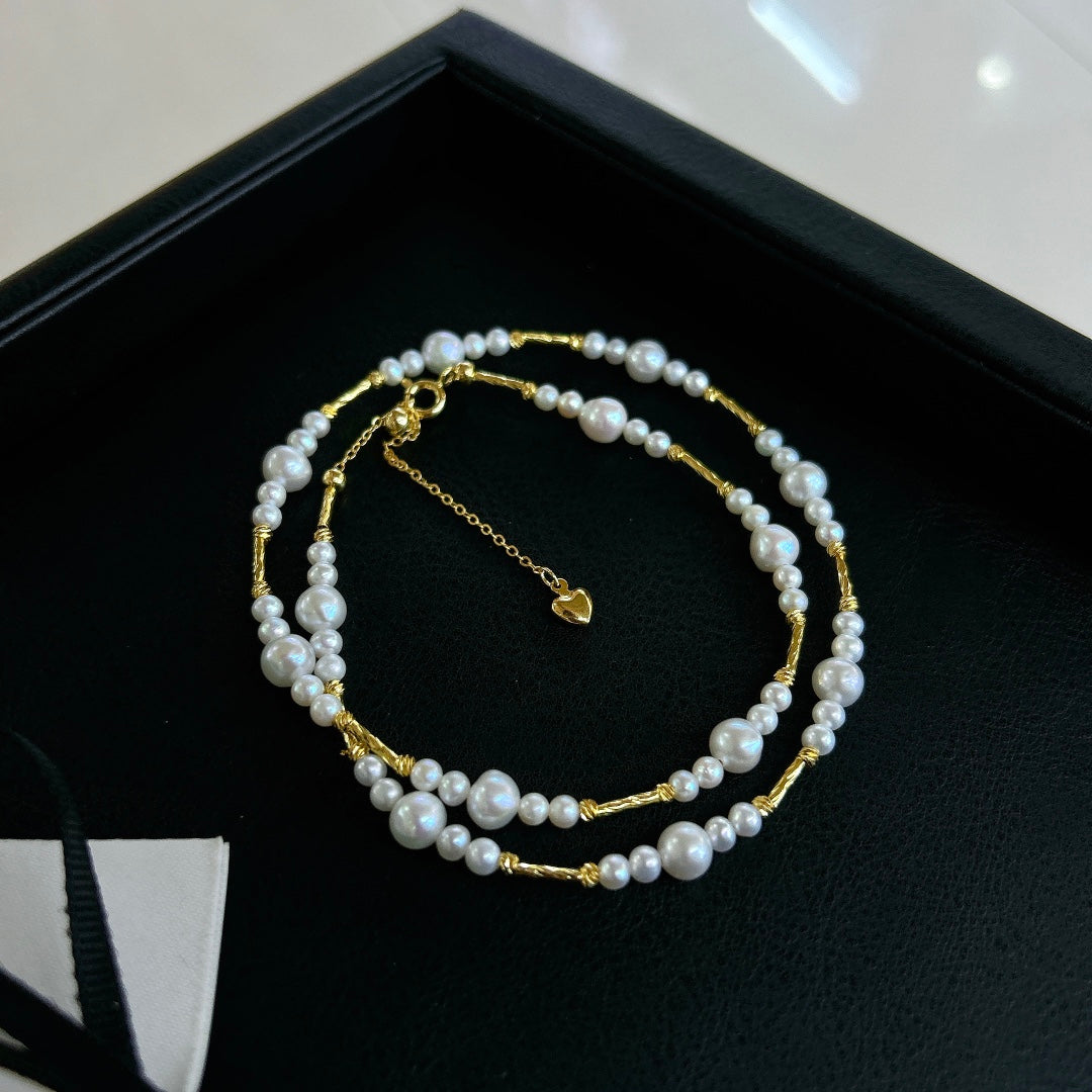 Gradient freshwater baby pearl necklace featuring 3–7mm pearls with adjustable clasp for a perfect fit.