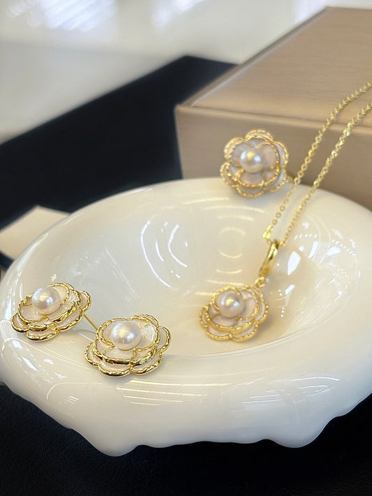 Vintage-style camellia pearl jewelry set featuring freshwater pearls and 14k gold-plated detailing.