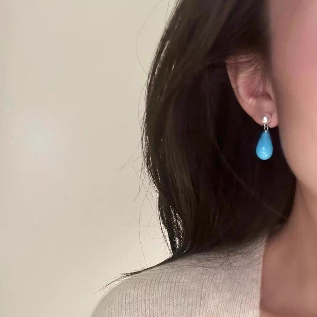 Turquoise and freshwater pearl stud earrings with sterling silver backing