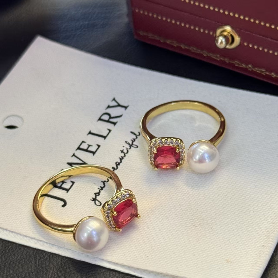 Ruby-inspired gold ring with a freshwater pearl centerpiece