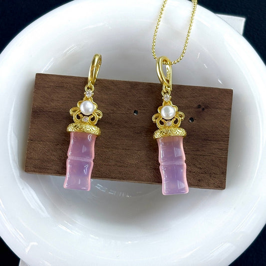 Jade and freshwater pearl pendant with bamboo-inspired gold accent