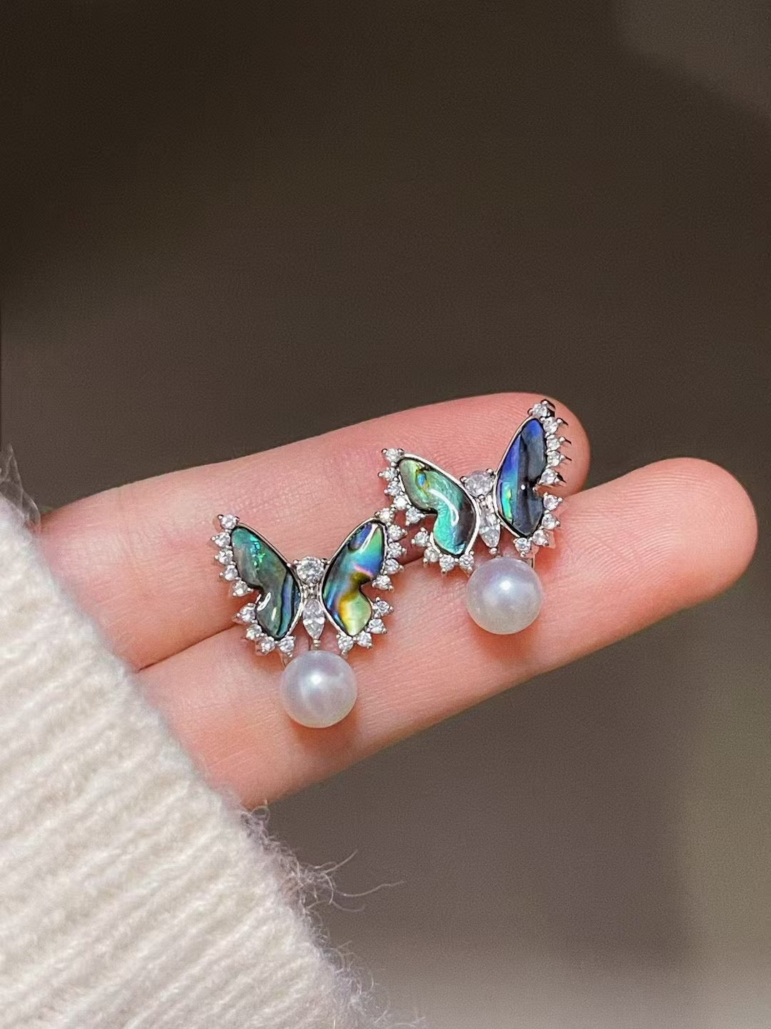 Abalone butterfly earrings with freshwater pearls on silver studs