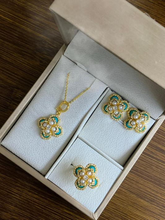 Sky blue clover pearl jewelry set with earrings, ring, and necklace
Vintage-style blue and pearl gift set by AnSes & Co.
