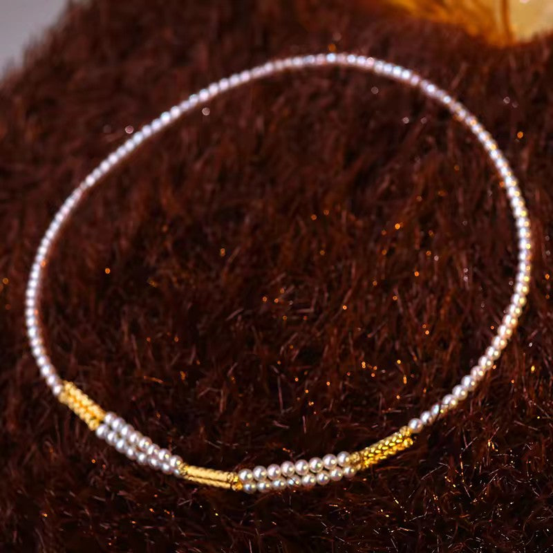 Convertible magnetic pearl necklace with bamboo-textured gold links and baby freshwater pearls